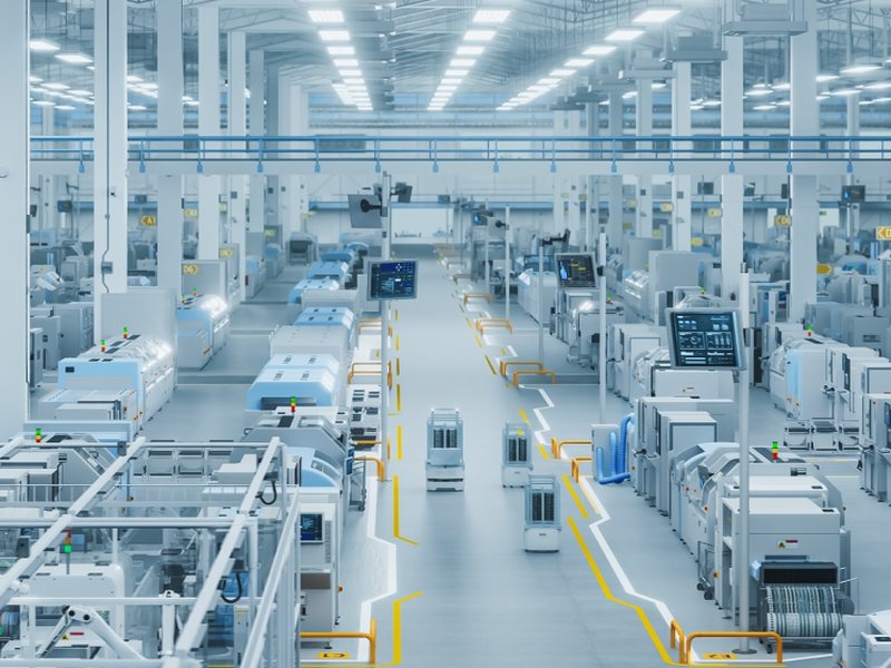 Modern factory floor with production lines and walkways